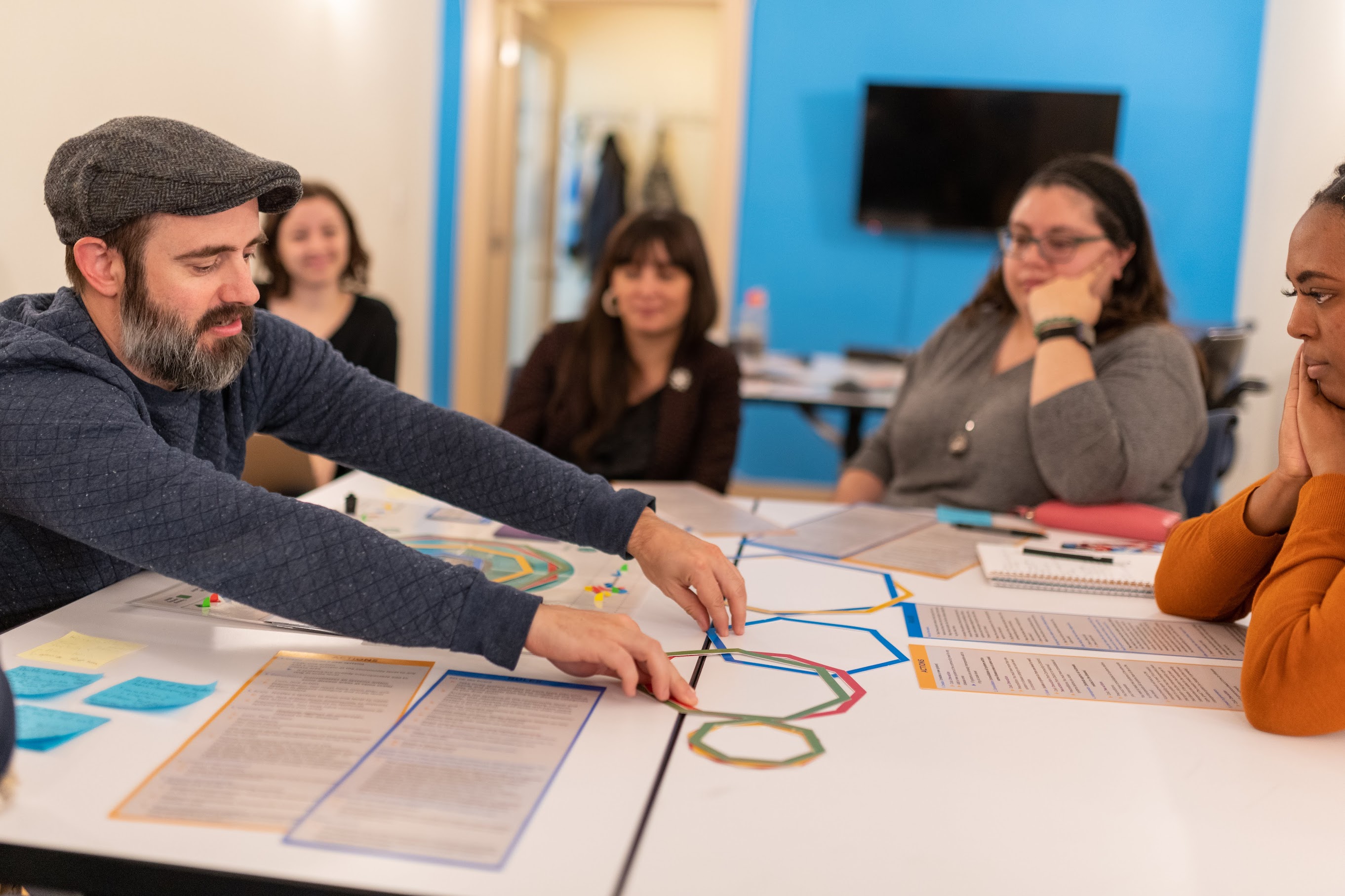 A TechChange team collaborating in a working session