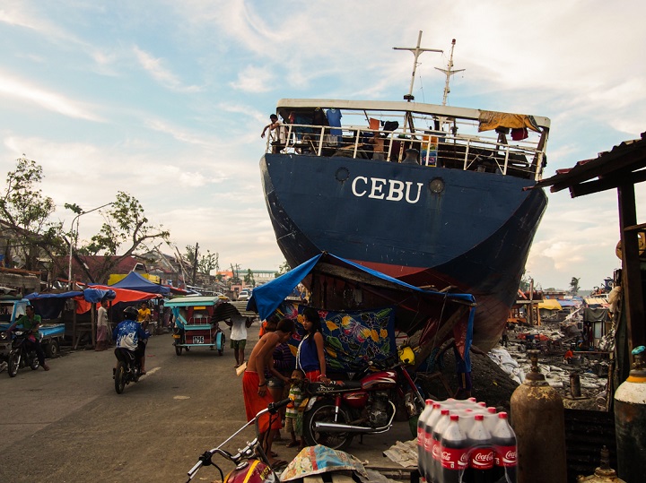 In Tacloban, a number of large ships were washed ashore by the typhoon. The survivors used the generators on some of these boats to supply them with electricity. Photo credit: Timo Luege