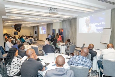 Photo of participants watching a panel at Kenya watch party